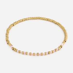 Armband roze kralen stretch goud