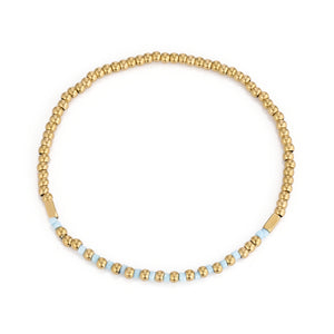 Armband turquoise kralen stretch goud