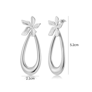 Oorstekers bloem druppel zilver