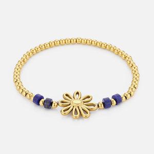 Armband blauwe kralen bloem stretch goud