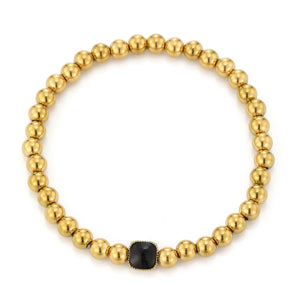 Beaded bracelet with black stone stretch