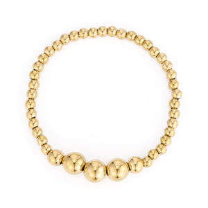 Armband grote bolletjes stretch goud