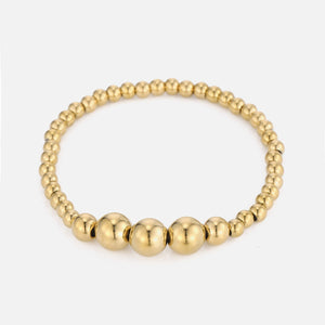 Armband grote bolletjes stretch goud