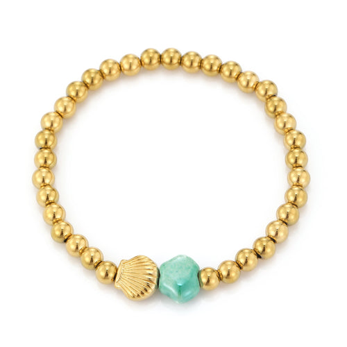 Armband schelp met turquoise steen stretch