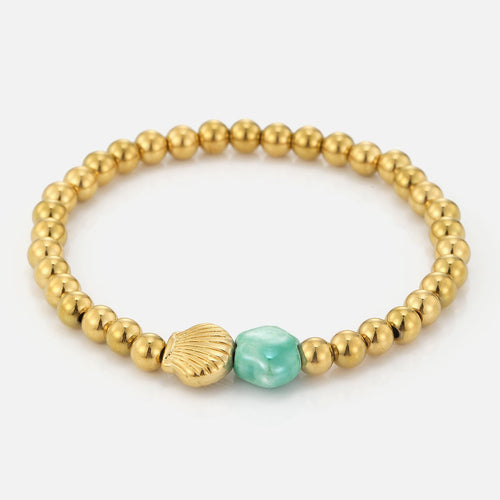 Armband schelp met turquoise steen stretch