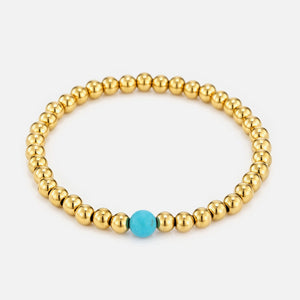 Armband turquoise natuursteen stretch - Goud