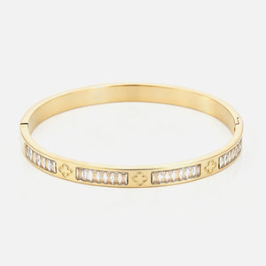 Rhinestone and clover bangle - Goud