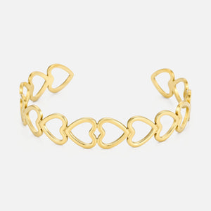 Bangle verbonden hartjes goud
