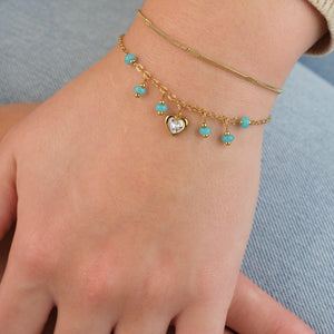 Dunne motief armband goud