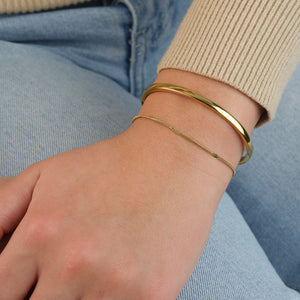 Dunne motief armband goud