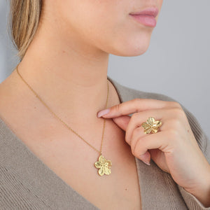Ketting bloem statement goud
