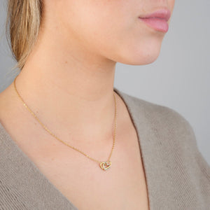 Ketting verbonden hart steentjes goud