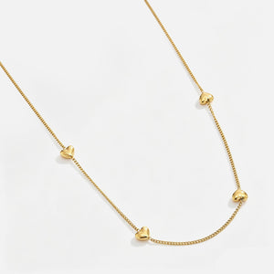 Lange ketting vier hartjes - Goud