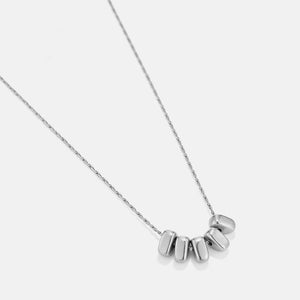 Mid-length necklace with five charms