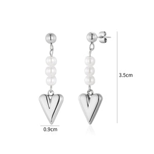 Oorstekers hangend hart parels zilver