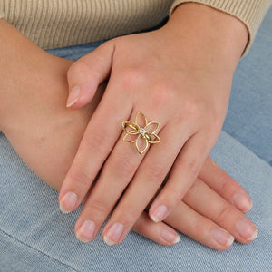 Ring bloem gehamerd goud