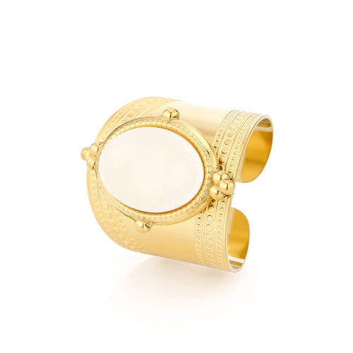 Wide band ring with white stone