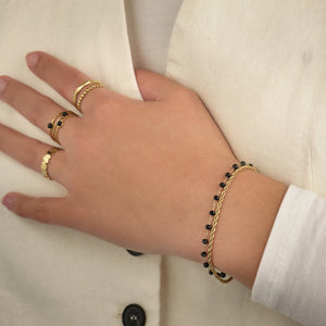 Ring three gems black goud