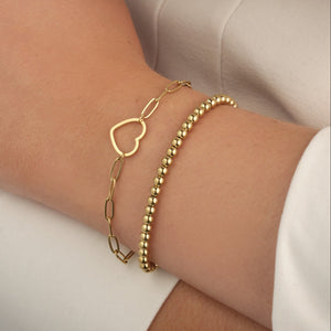 Schakelarmband grote hart goud