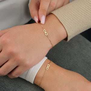 Set armbanden infinity goud