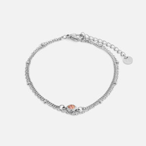 Tweelaags armband met roze steentje