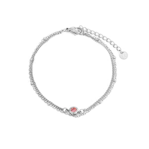 Tweelaags armband met roze steentje