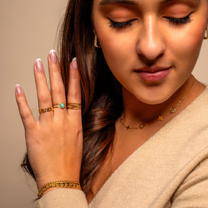 Ring gekruiste motieven goud