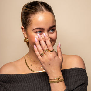 Ring gekruiste motieven goud